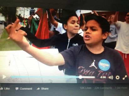 bernie-and-hillary-brown-pride-supporter-with-finger-in-the-air